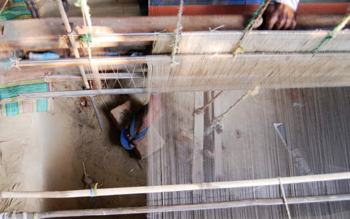 Amitava-mans-foot-through-working-loom Amitava-mans-foot-through-working-loom