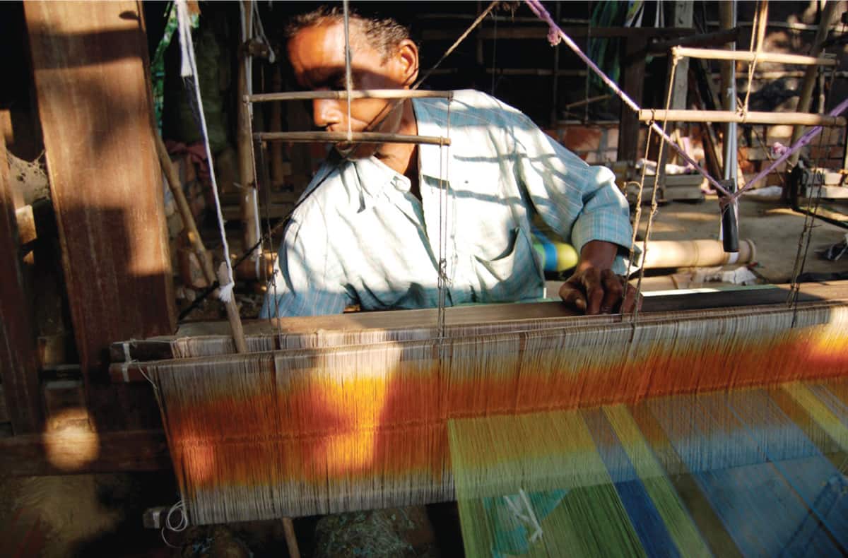 Working at a loom - Chhandabrati Weavers