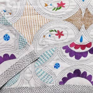 Tara phool kantha bed cover