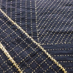 Reversible kantha bed cover