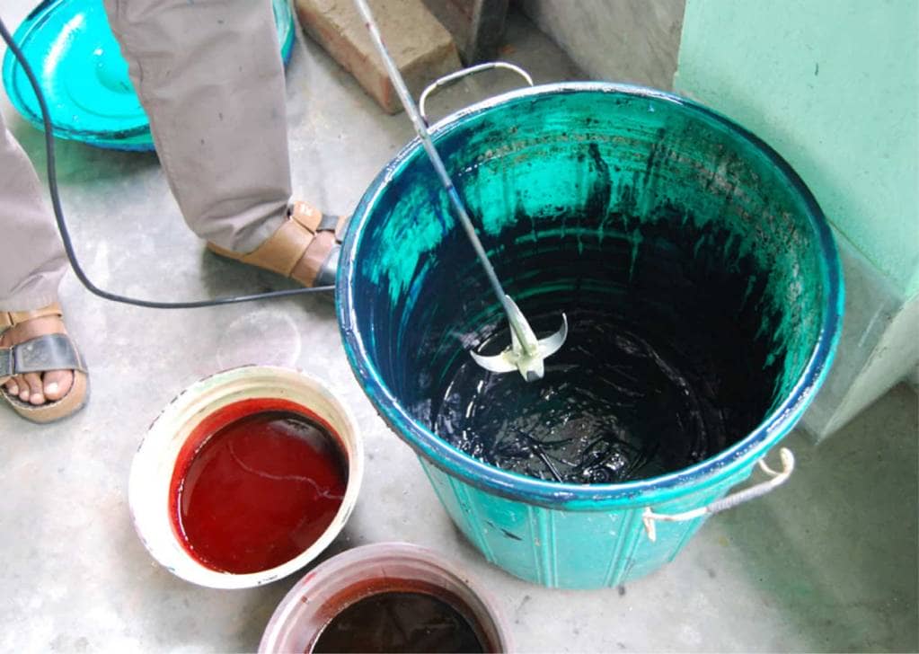 mixing-large-bucket-paint Brindaban Prints mixing colors