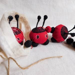 Lady bird hanging with bell