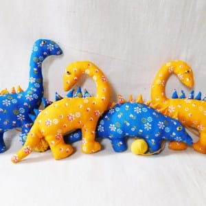 Dinosaur hanging with ball