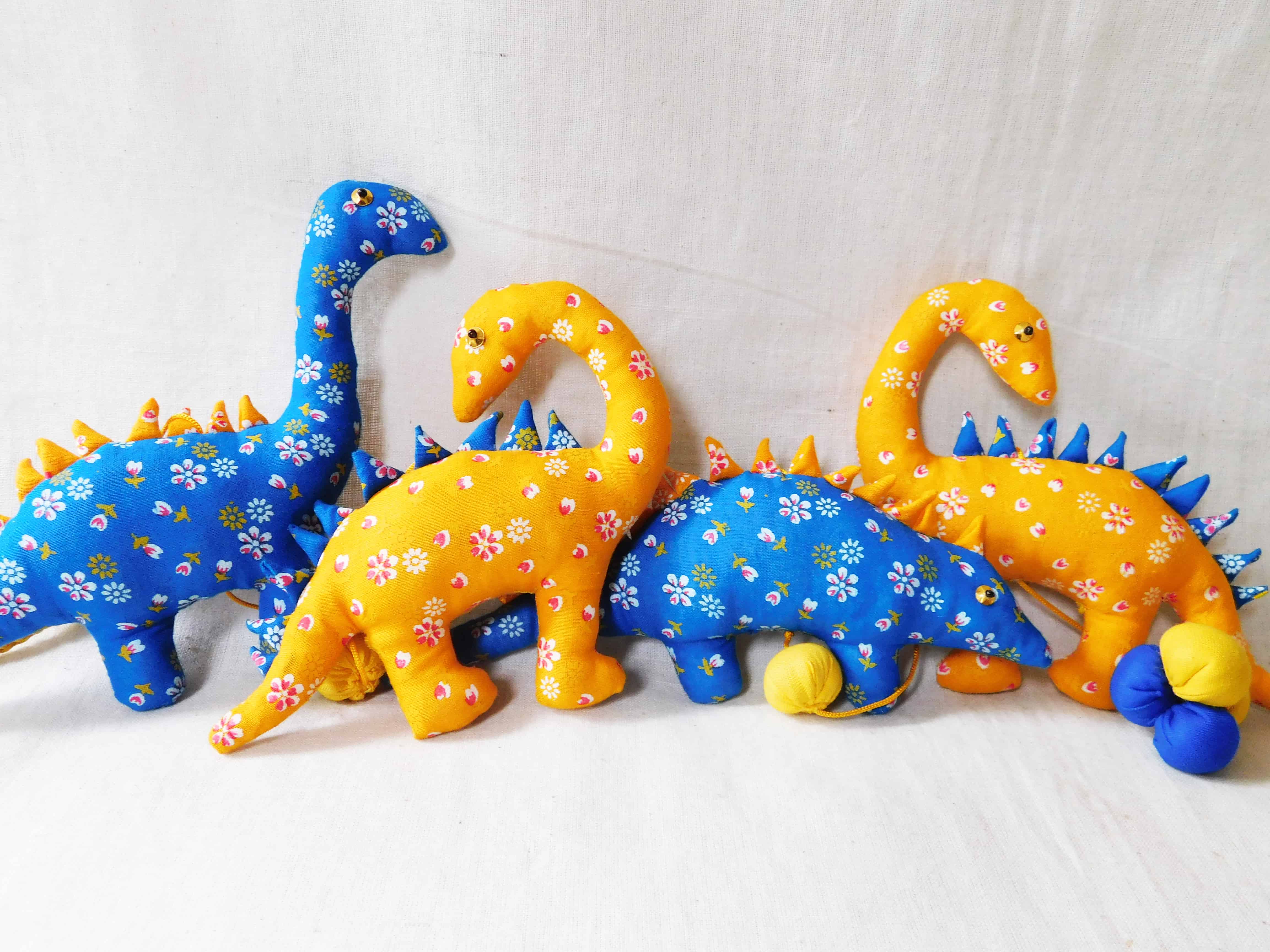 Dinosaur hanging with ball