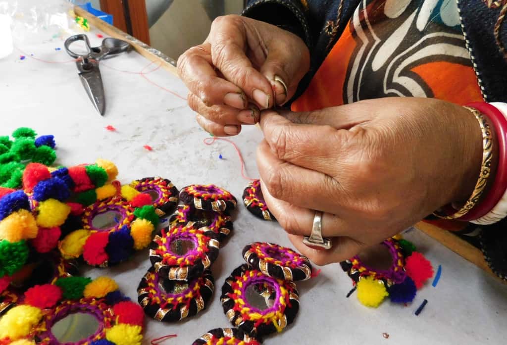 Closeup woman's hands working at Prachesta